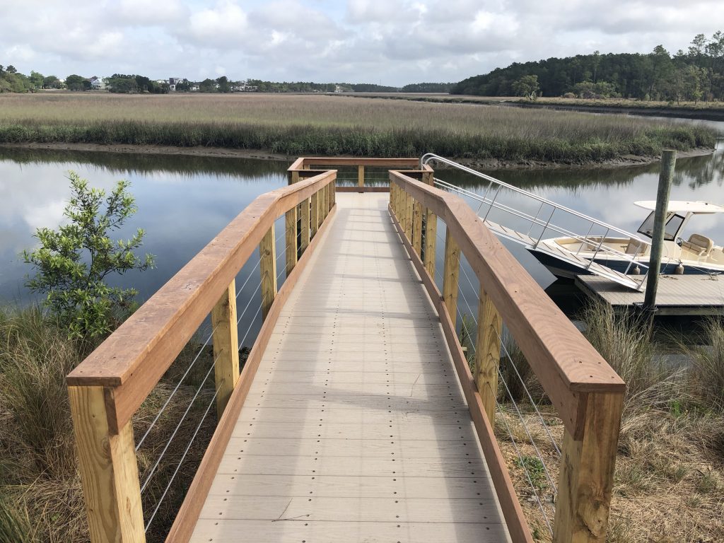 Aluminum framed walkway with composite decking and Ipe handrails on Captains Island, SC